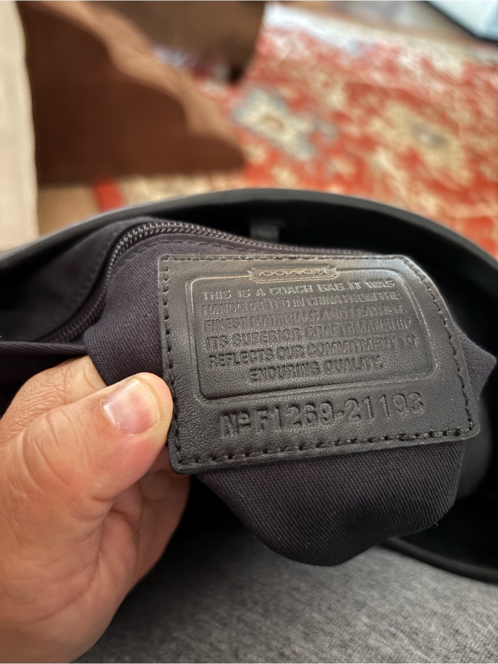 Coach Black Leather Crossbody Pouch with Embossed Logo Patch
